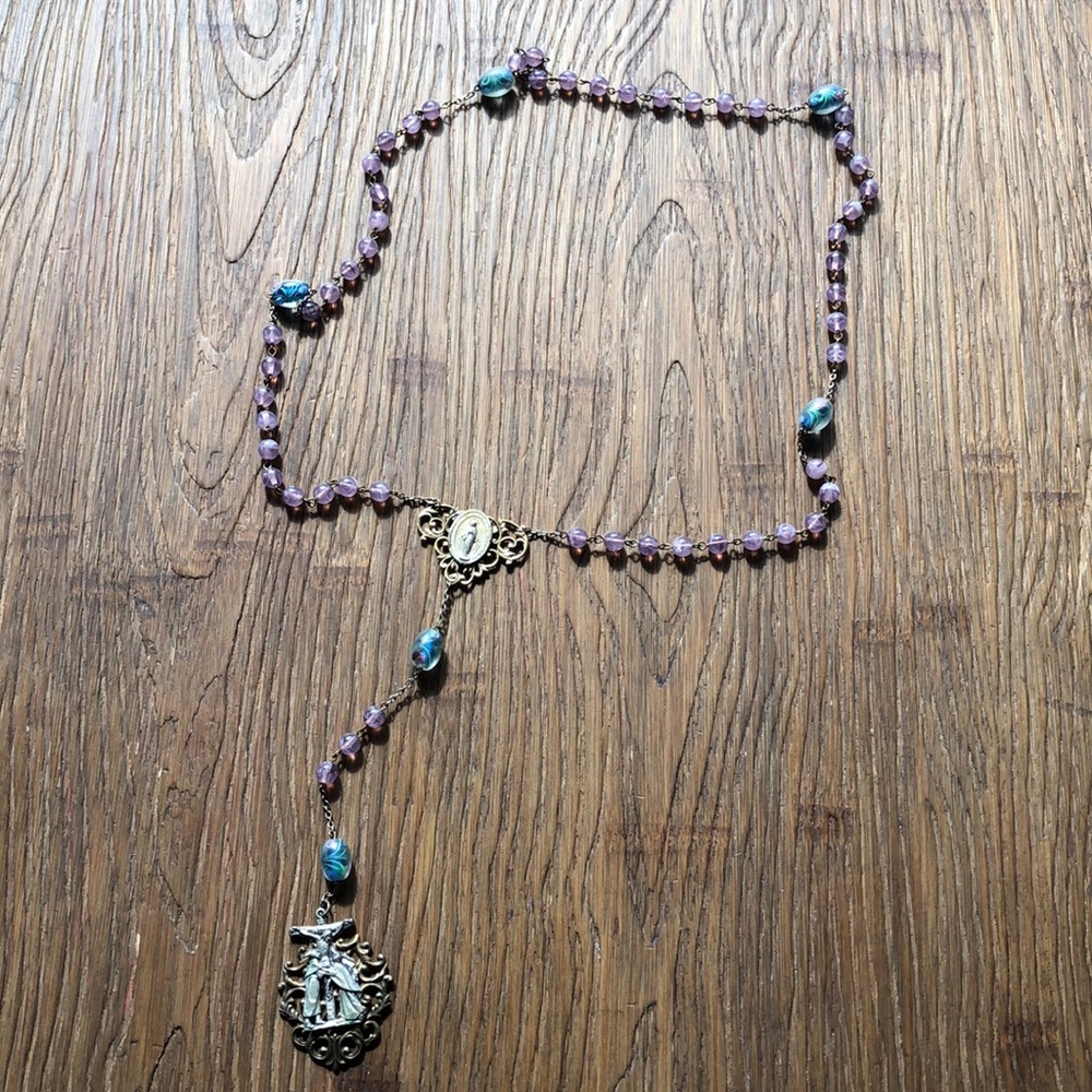 Rosary purple and w/ blue and green floral beads